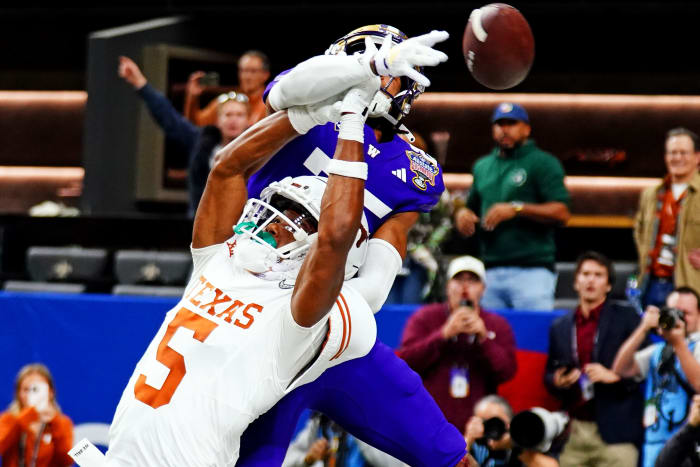 Texas Longhorns Adonai Mitchell misses a catch against Washington in the 2024 College Football Playoff semifinal in the Sugar Bowl